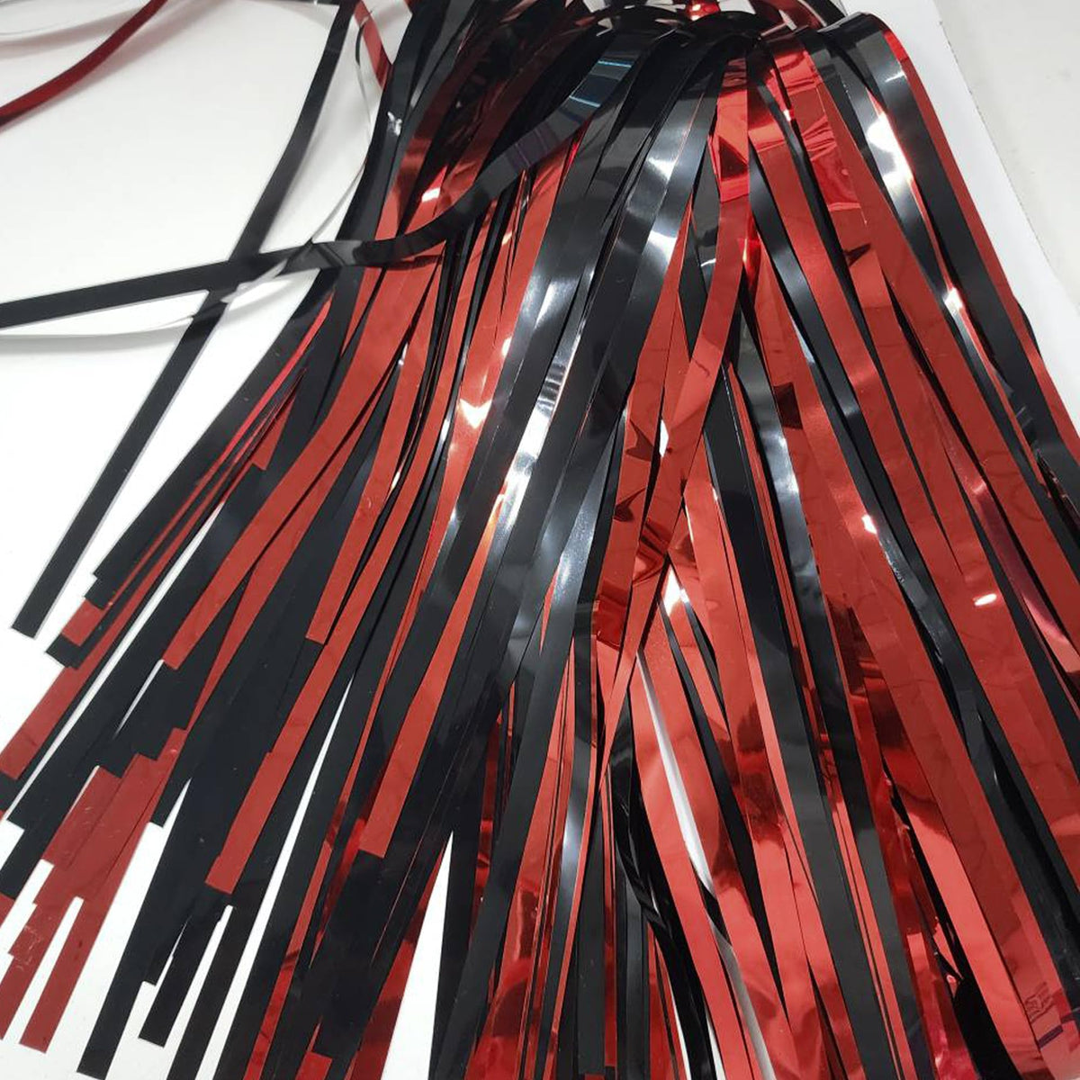 GREATRIL Dramatic door or wall decor with shimmering fringe.