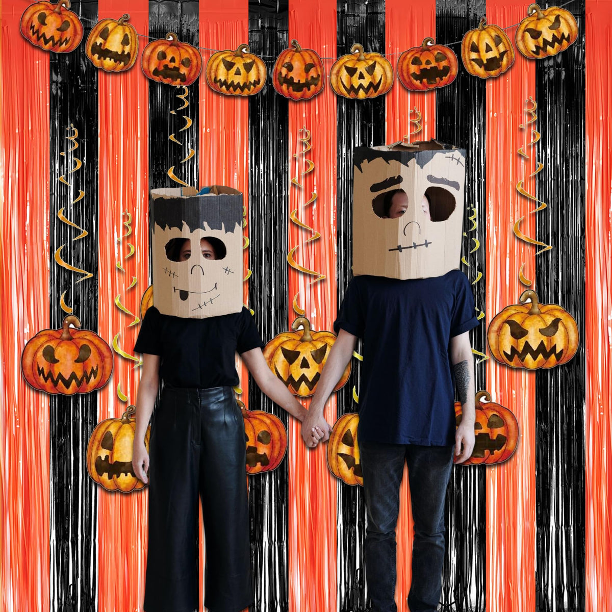 GreatRIL halloween tinsel curtain decor creates a shiny wall backdrop for celebrations.