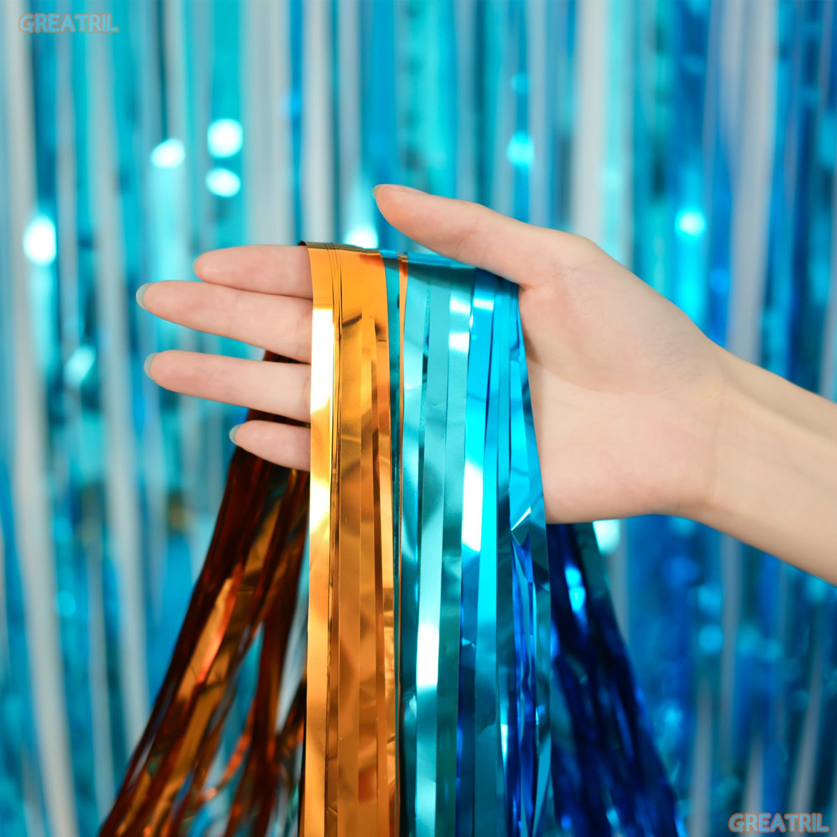 GREATRIL tinsel fringe curtain adds sparkling color to walls and doors.