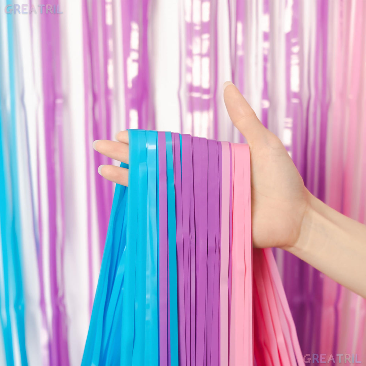 GREATRIL pastel foil fringe curtain adds shimmer to birthday party photos.