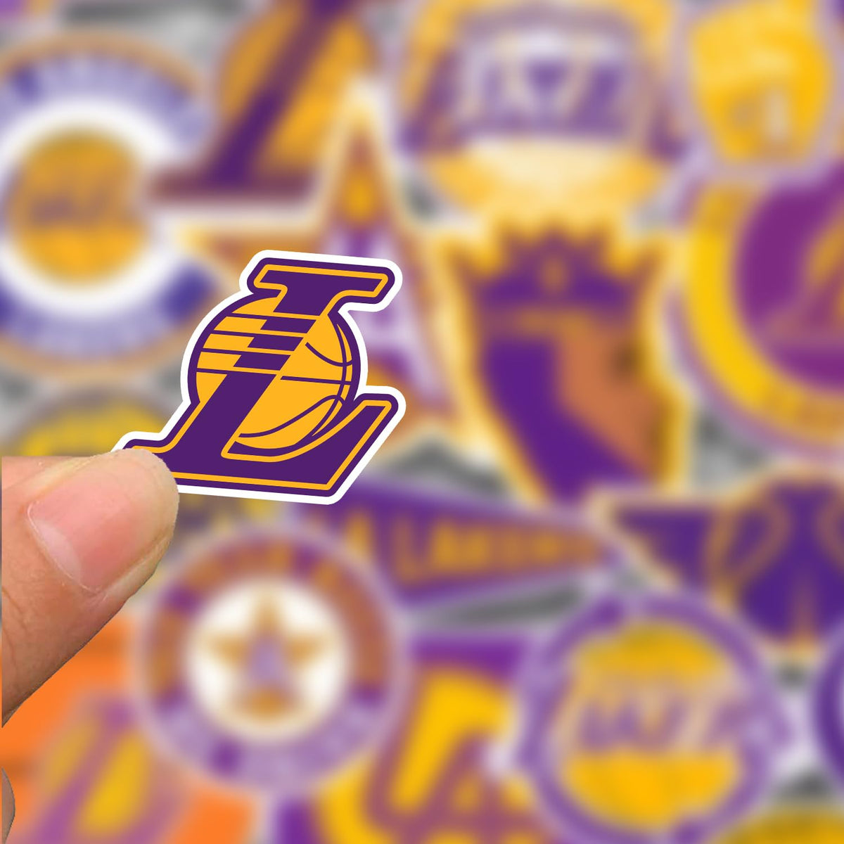 GROWING Lakers stickers on a skateboard display bold court vibes anywhere.