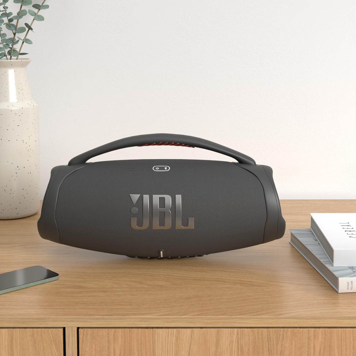 GSport carbon fiber hard shell case secures JBL Boombox 3 for travel