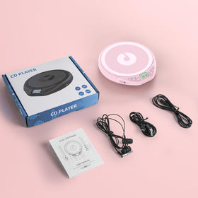 Gueray playing CD in a casual setting highlighting on-the-go listening