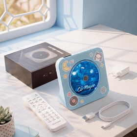 gueray next to a book for scale, compact desktop footprint demonstration