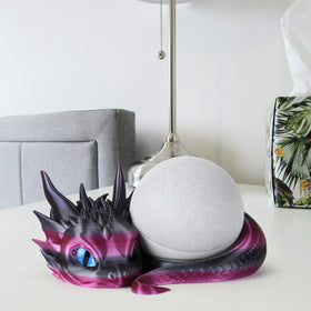 Guwewu dragon stand in use with Echo Dot demonstrating secure fit and accessibility