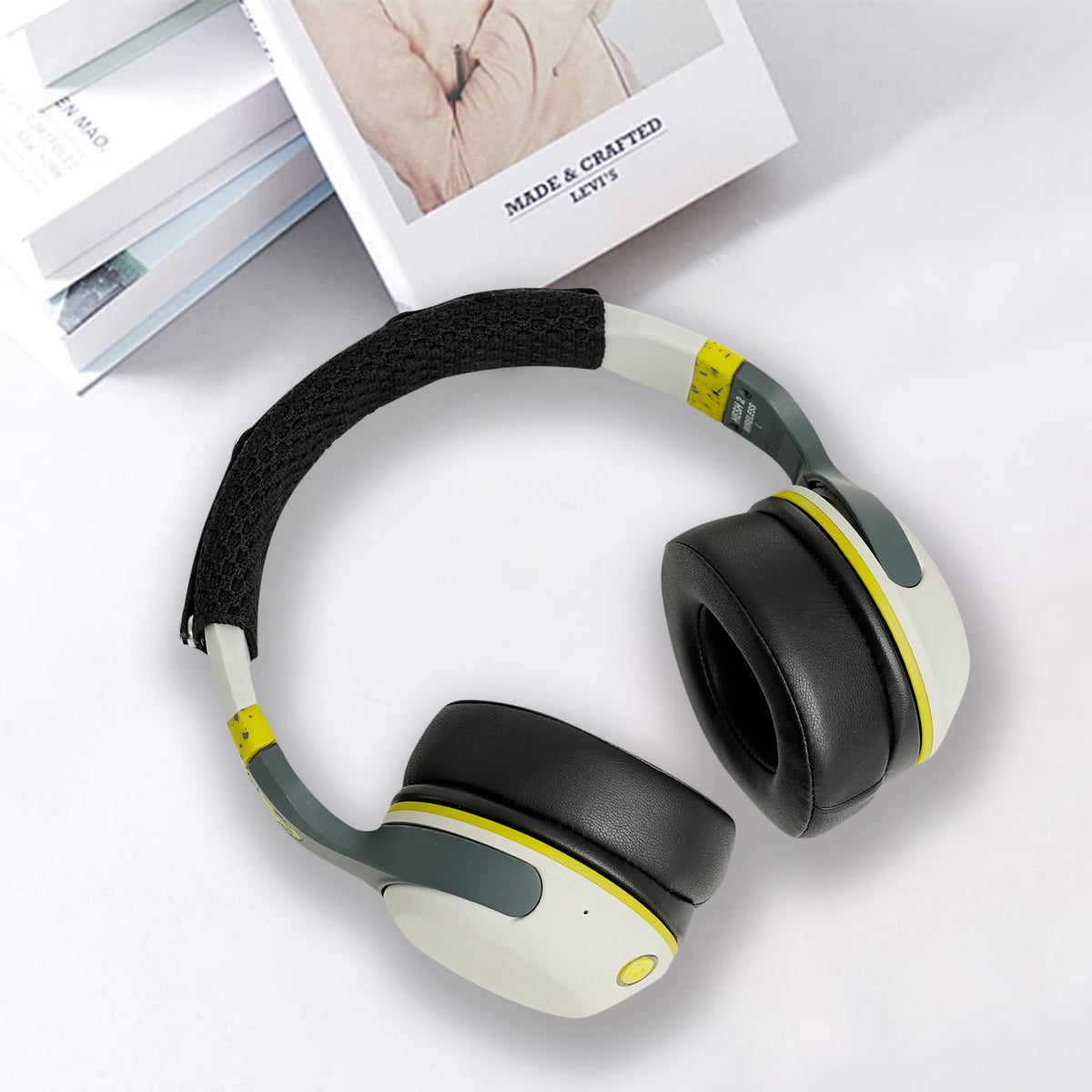 G GVOEARS lifestyle scene of person using refreshed headphones at a desk