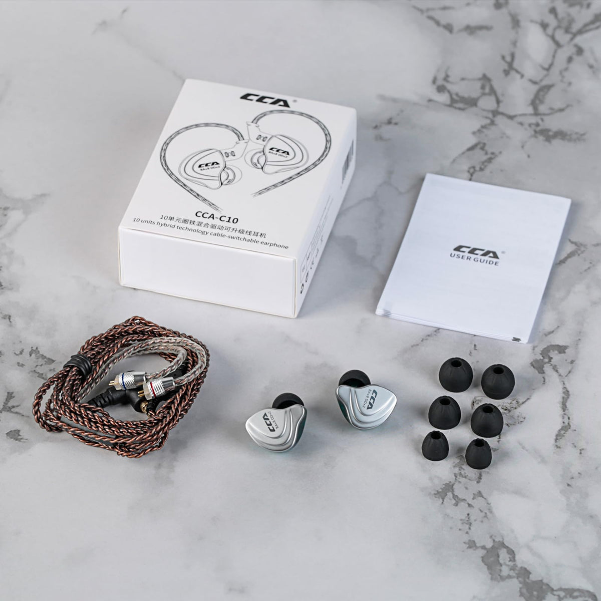 H HIFIHEAR CCA C10 next to a coin showing compact portable scale