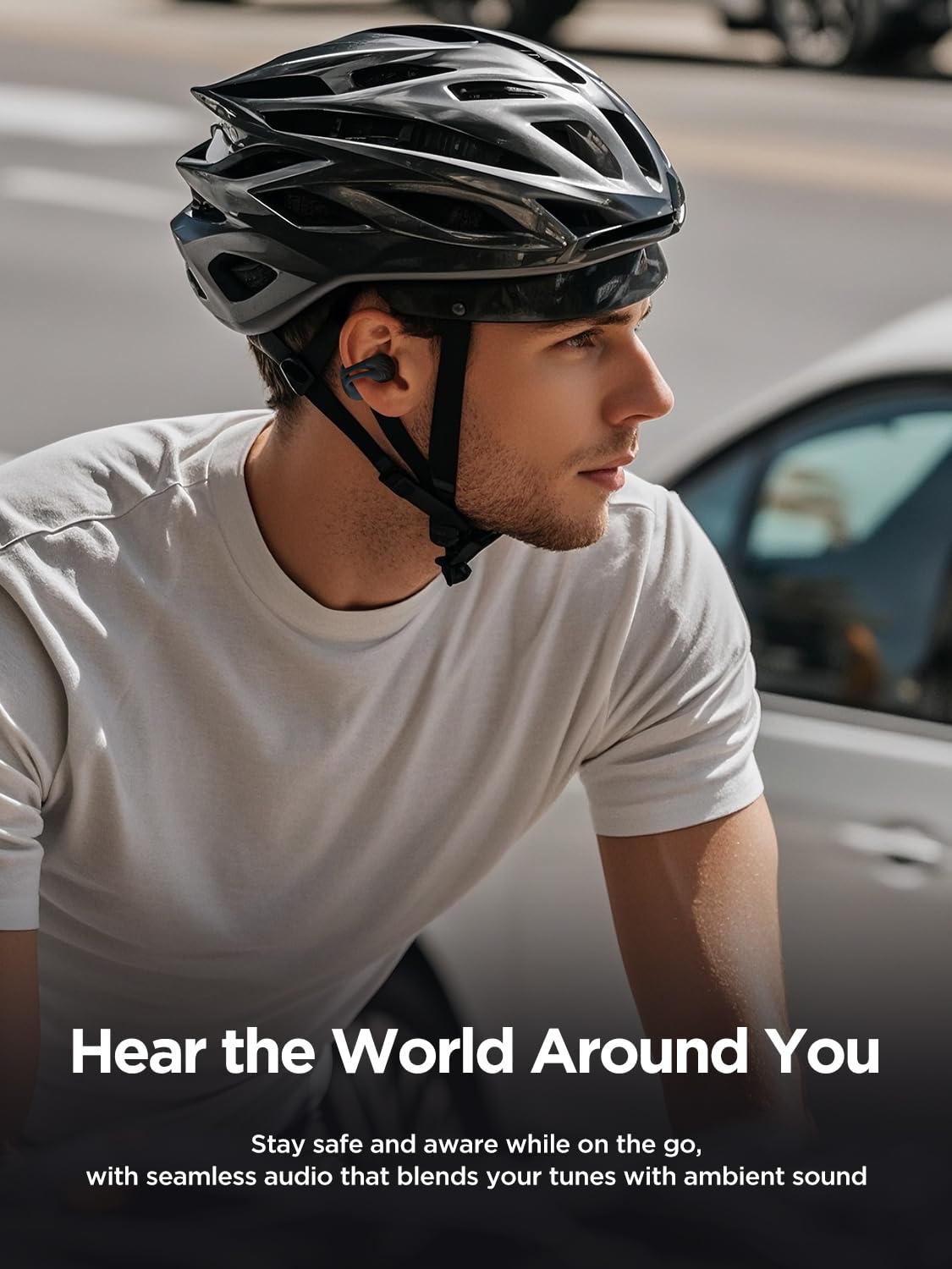 HAKII earbuds worn by runner showing secure fit and safety benefit