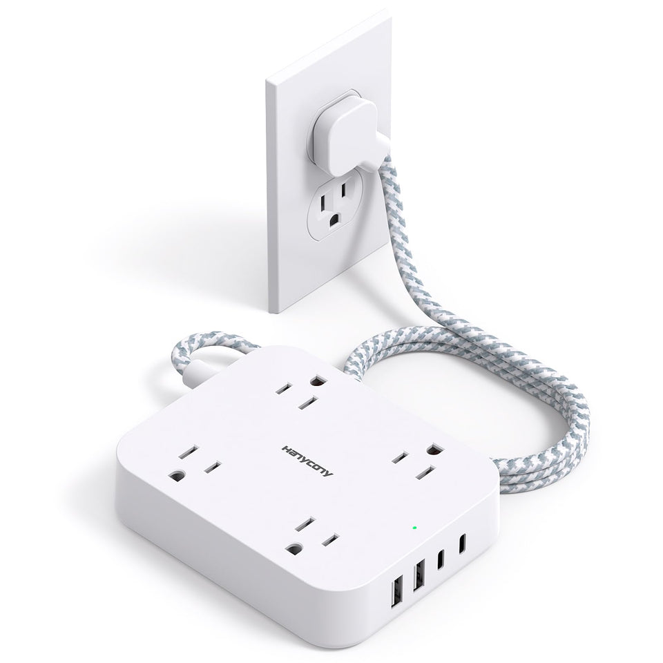 HANYCONY flat-plug extension cord beside a wall outlet for space-saving access.