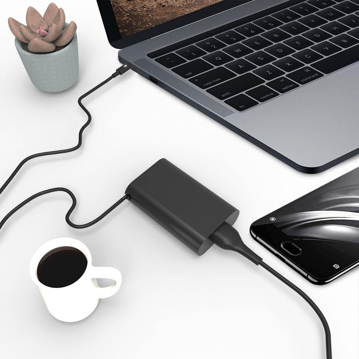 HBONY 65W USB-C charger close-up highlights safety features and build quality.