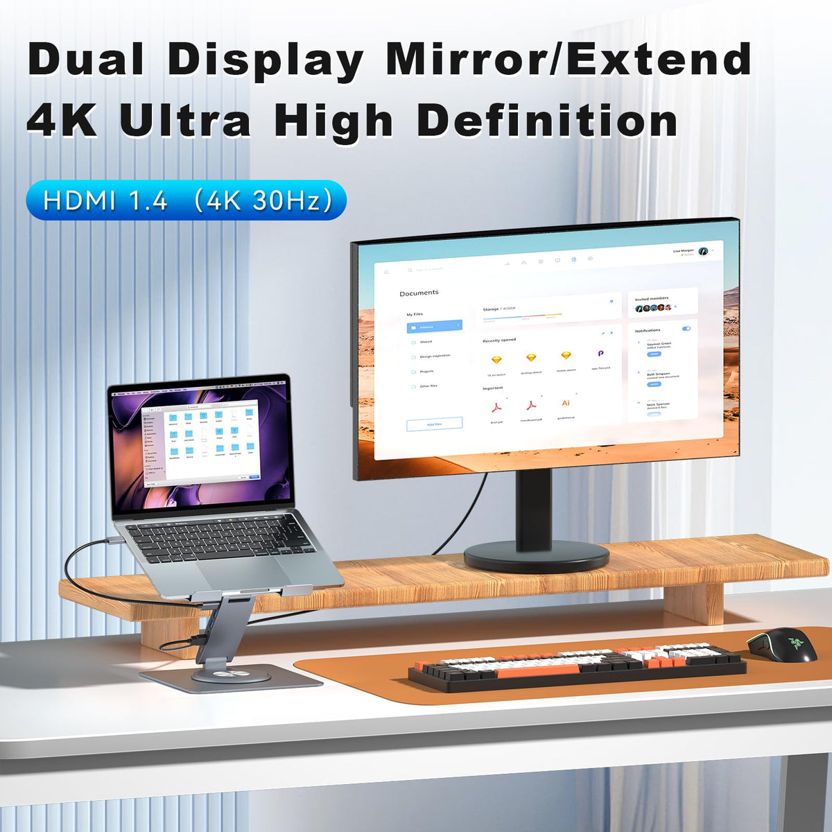 HC laptop on stand connected to dual monitors for extended desktop productivity