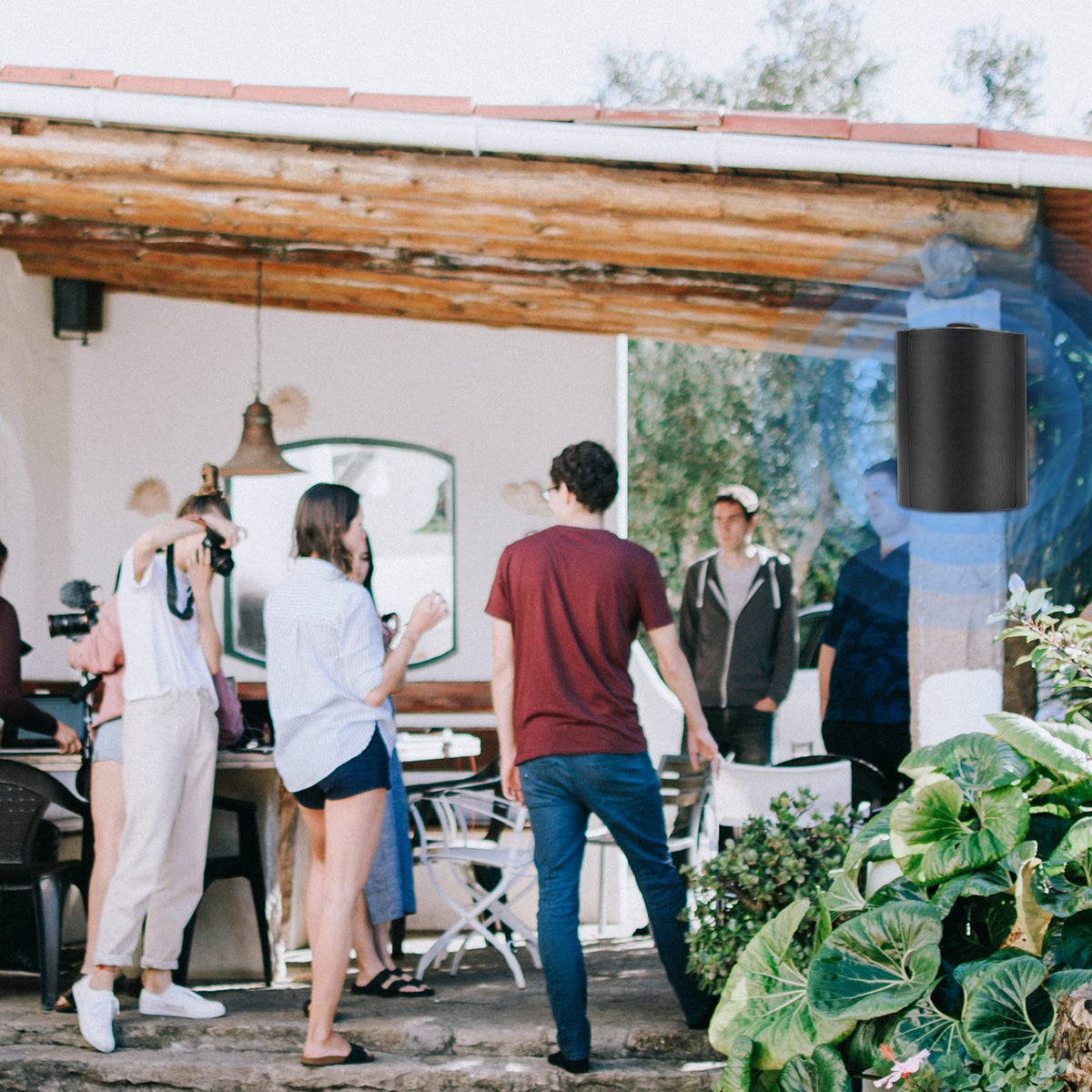 Herdio outdoor speakers in use on patio or deck setup