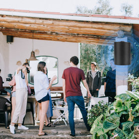 Herdio outdoor speakers in use on patio or deck setup