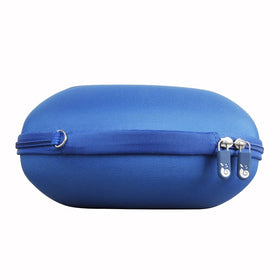 Hermitshell next to backpack showing compact travel-friendly size