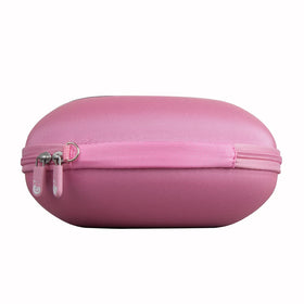 Hermitshell next to a backpack showing compact travel-friendly size