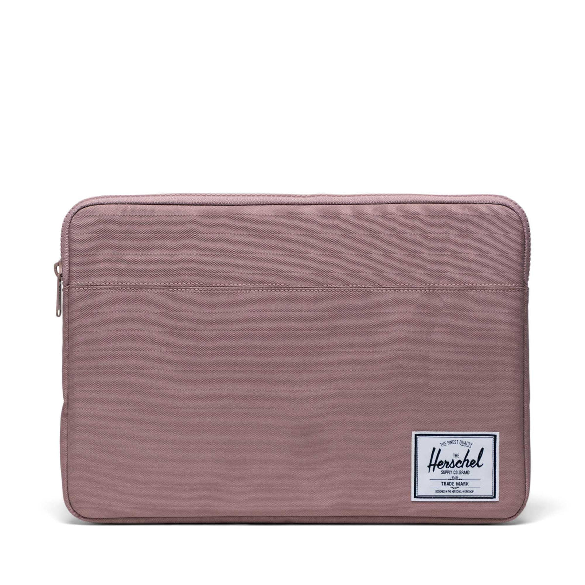 Herschel Anchor sleeve front view in pink showing slim protective shape and easy carry