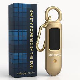 HerTime2 front view of gold alarm shows compact form and clear controls