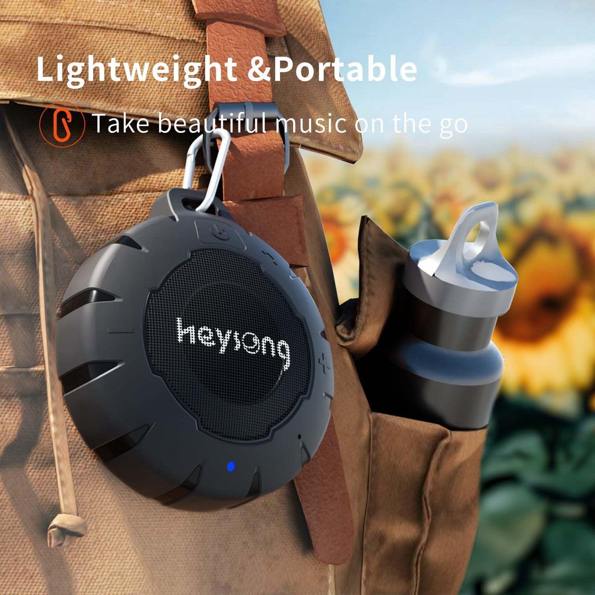 HEYSONG in a hand showing compact size and portable convenience