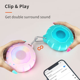 HEYSONG on beach towel showing durable outdoor sound and fun lighting