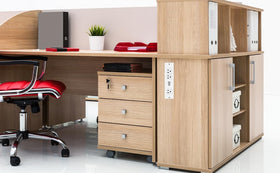 HEZI under-couch installation showing convenient power access.