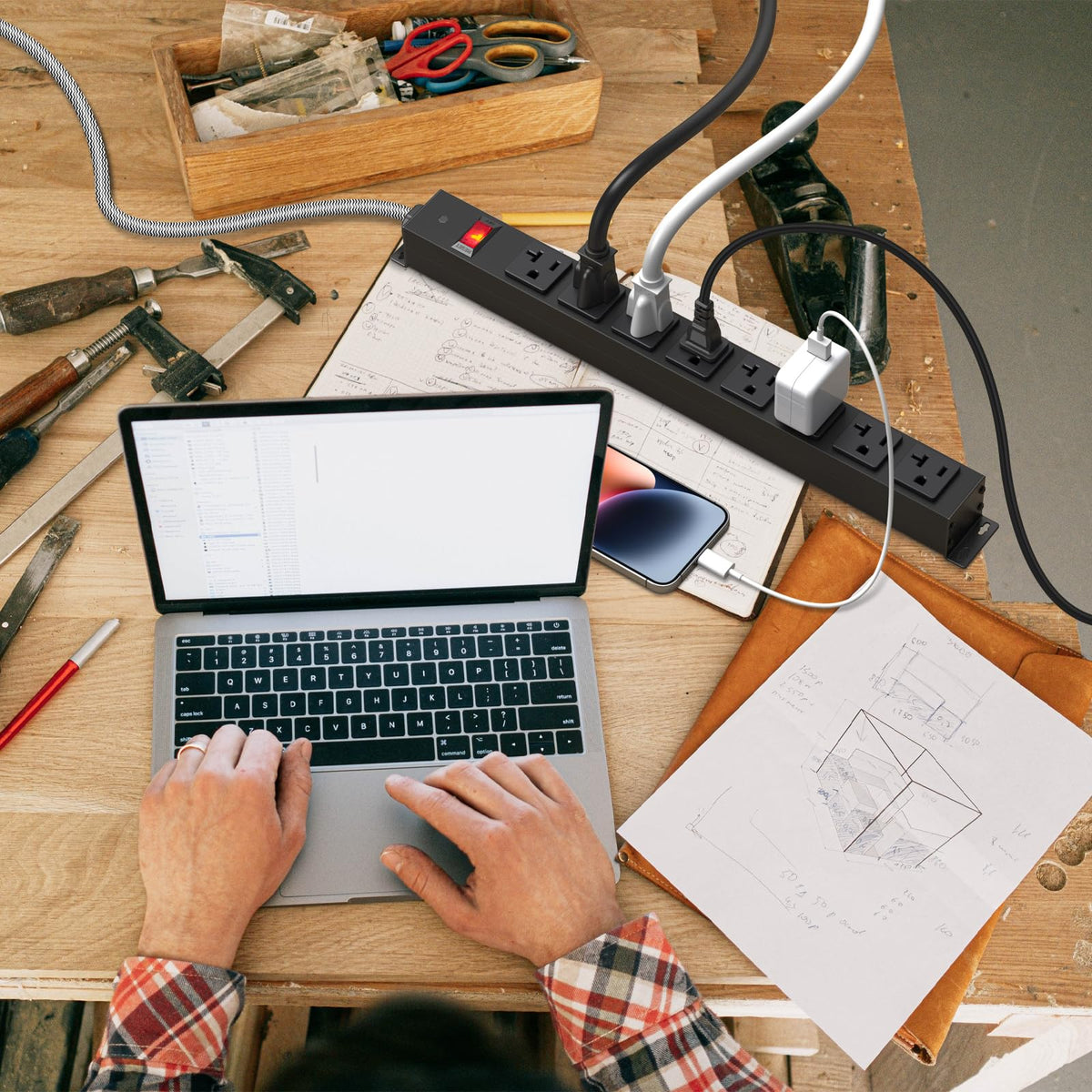 HEZI installed on a garage workbench keeping tools powered and cords tidy