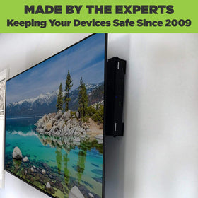 HIDEit Mounts lifestyle shot in living room hiding devices neatly