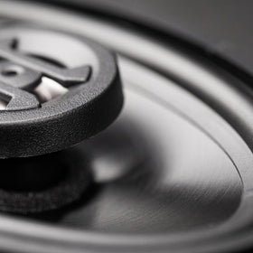 Hifonics speakers in a car interior lifestyle shot showcasing improved sound