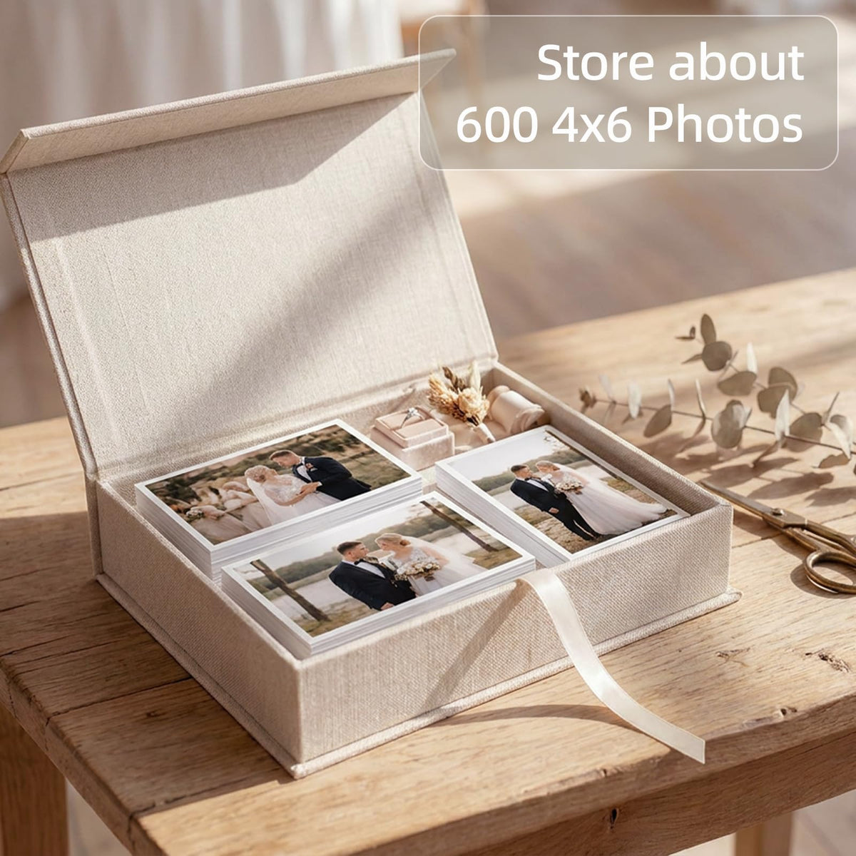 Hiwhy linen storage box contents organized for photos, jewelry, and keepsakes.