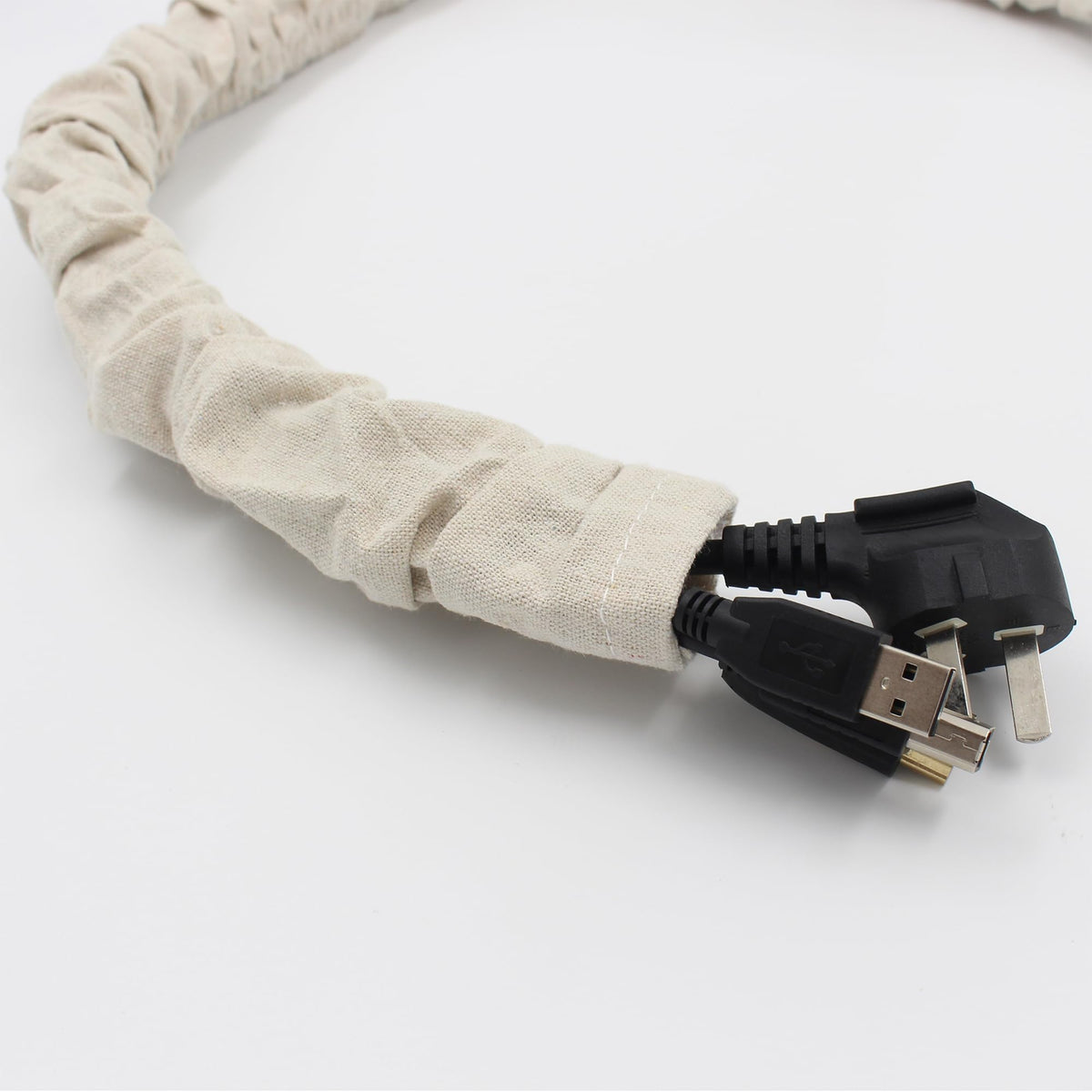 Hkoaodeo chain sleeve covering cords behind a wall-mounted TV for tidier setup