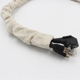 Hkoaodeo chain sleeve covering cords behind a wall-mounted TV for tidier setup