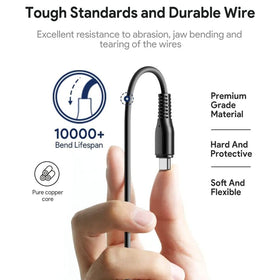 HKY next to laptop showing compact size for easy portability