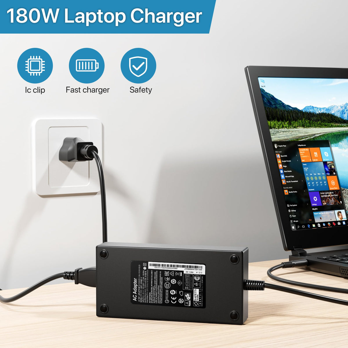 HNHTKJ adapter beside a laptop for scale to confirm compact portability benefit