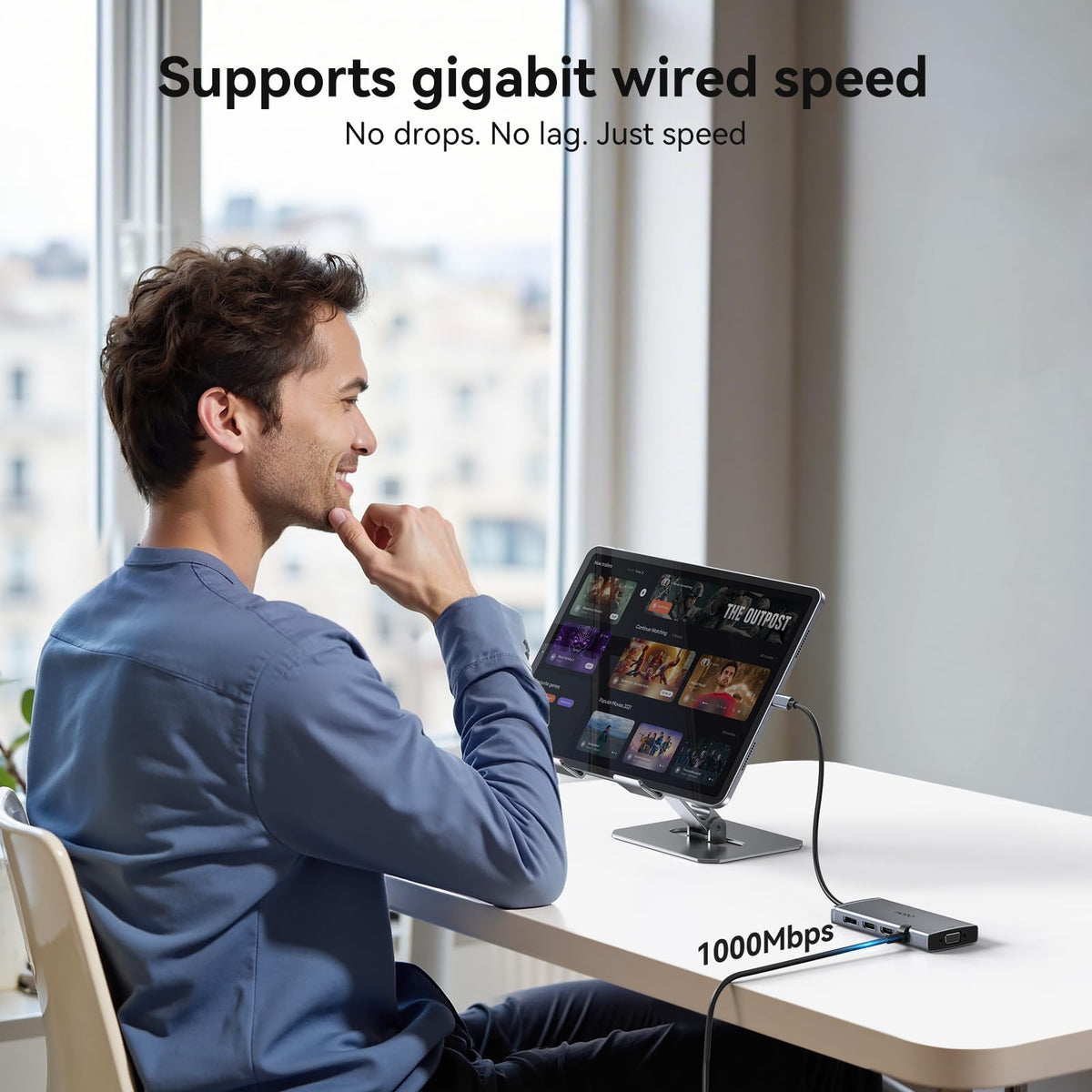 HODO on a modern desk with laptop and monitors to boost multi-screen workflows