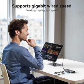 HODO docking station in home office lifestyle illustrating multi-monitor remote work setup