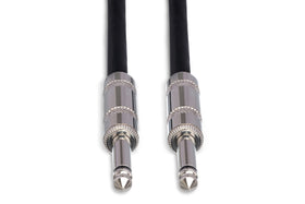 Hosa SKJ-620 in a stage setup between amp and speaker showing flexible reach benefit