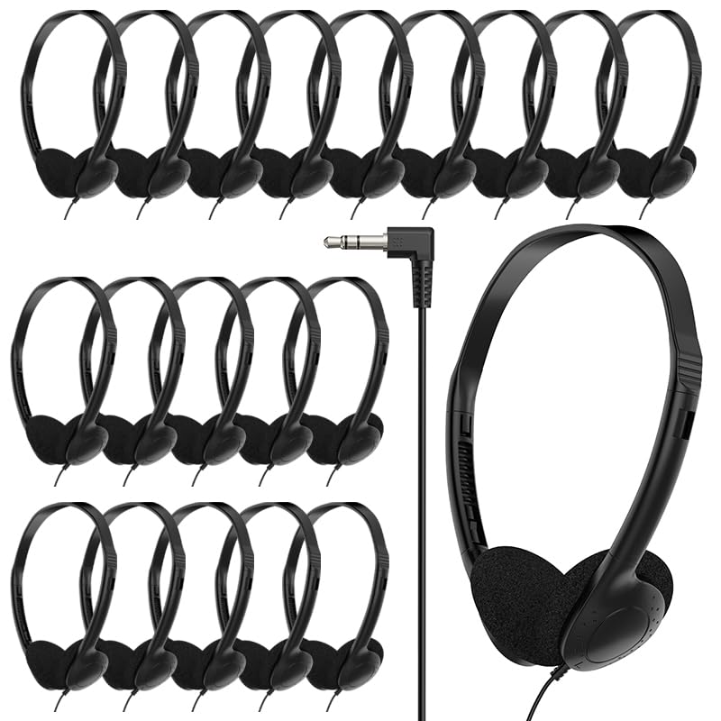 HOTKUDO bulk classroom headphones on a desk, ready for a group lesson.