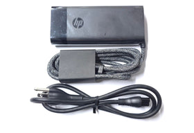 HP 100W USB-C Charger back view with labeling for quick checks.