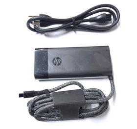 HP 100W USB-C Charger cable neatly wrapped for portable use.