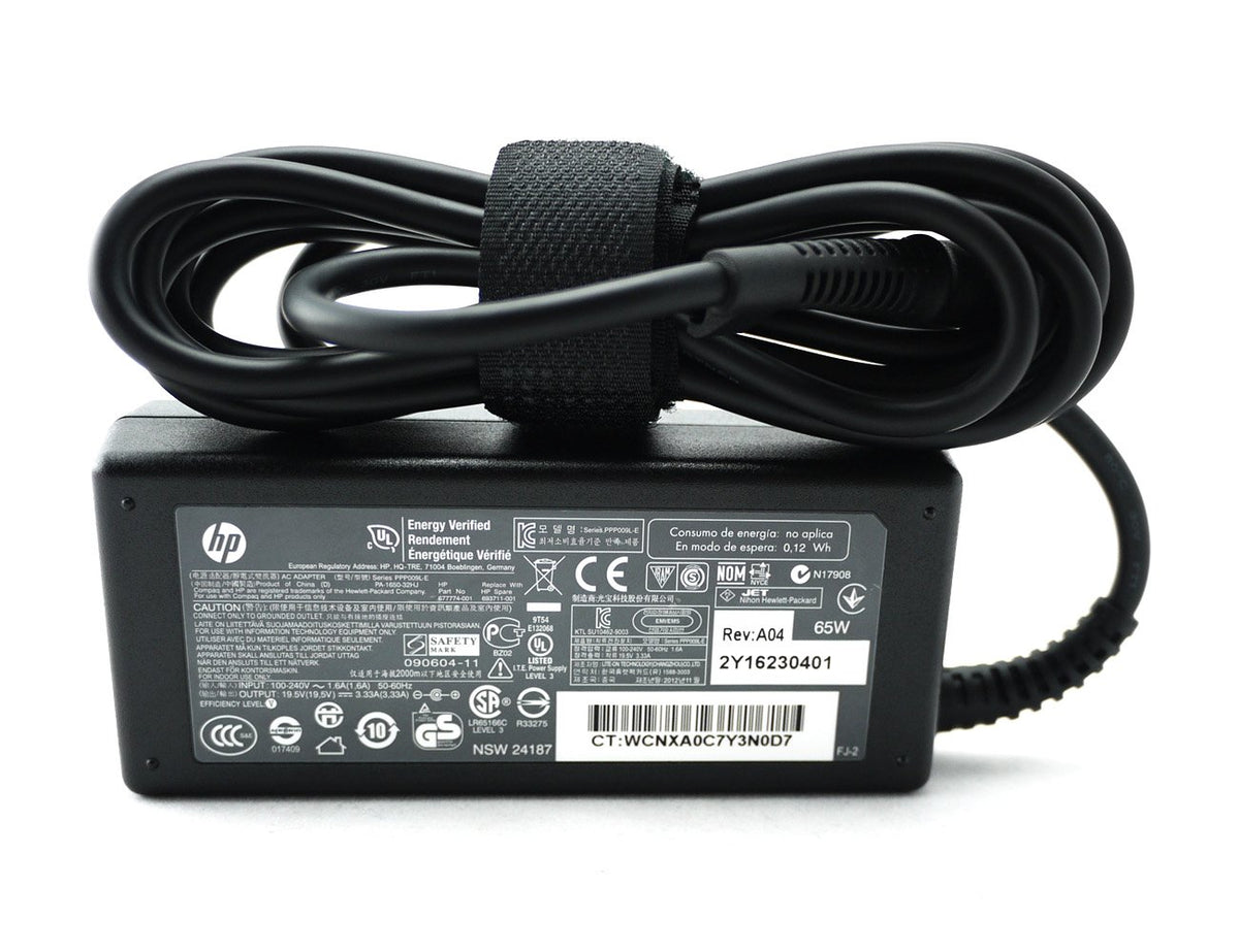 HP 65W adapter front view showing compact design and labeling for safe charging