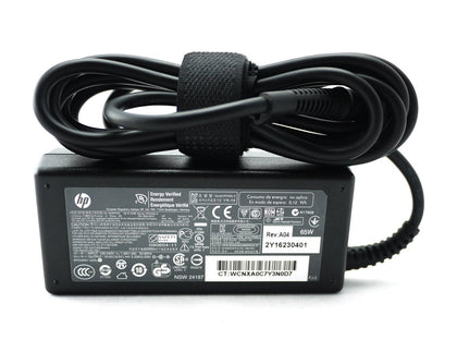HP 65W adapter front view showing compact design and labeling for safe charging