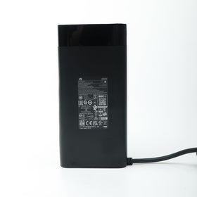 HP adapter side profile with label and vents indicating reliable cooling