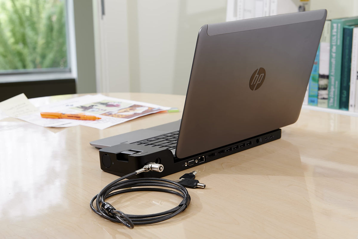 HP D9Y32AA UltraSlim Dock 65W adapter powering a connected EliteBook