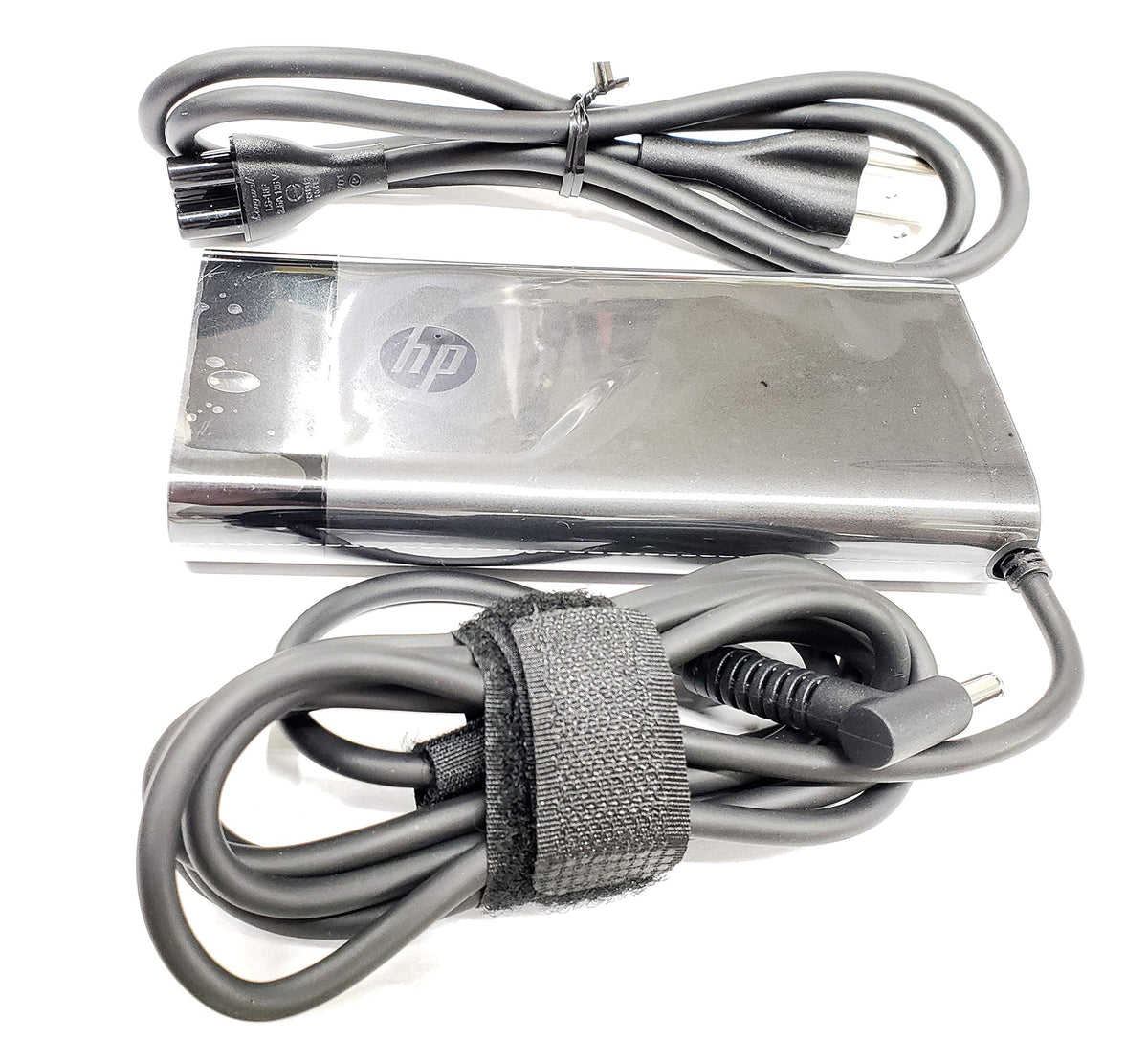 HP adapter front view showing compact design and dependable power