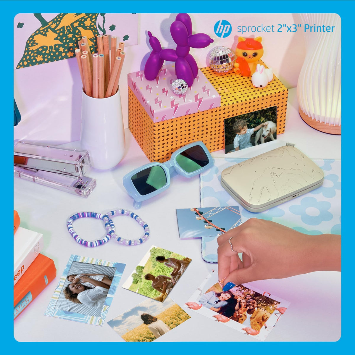 HP Sprocket app interface with frames, filters, and stickers.