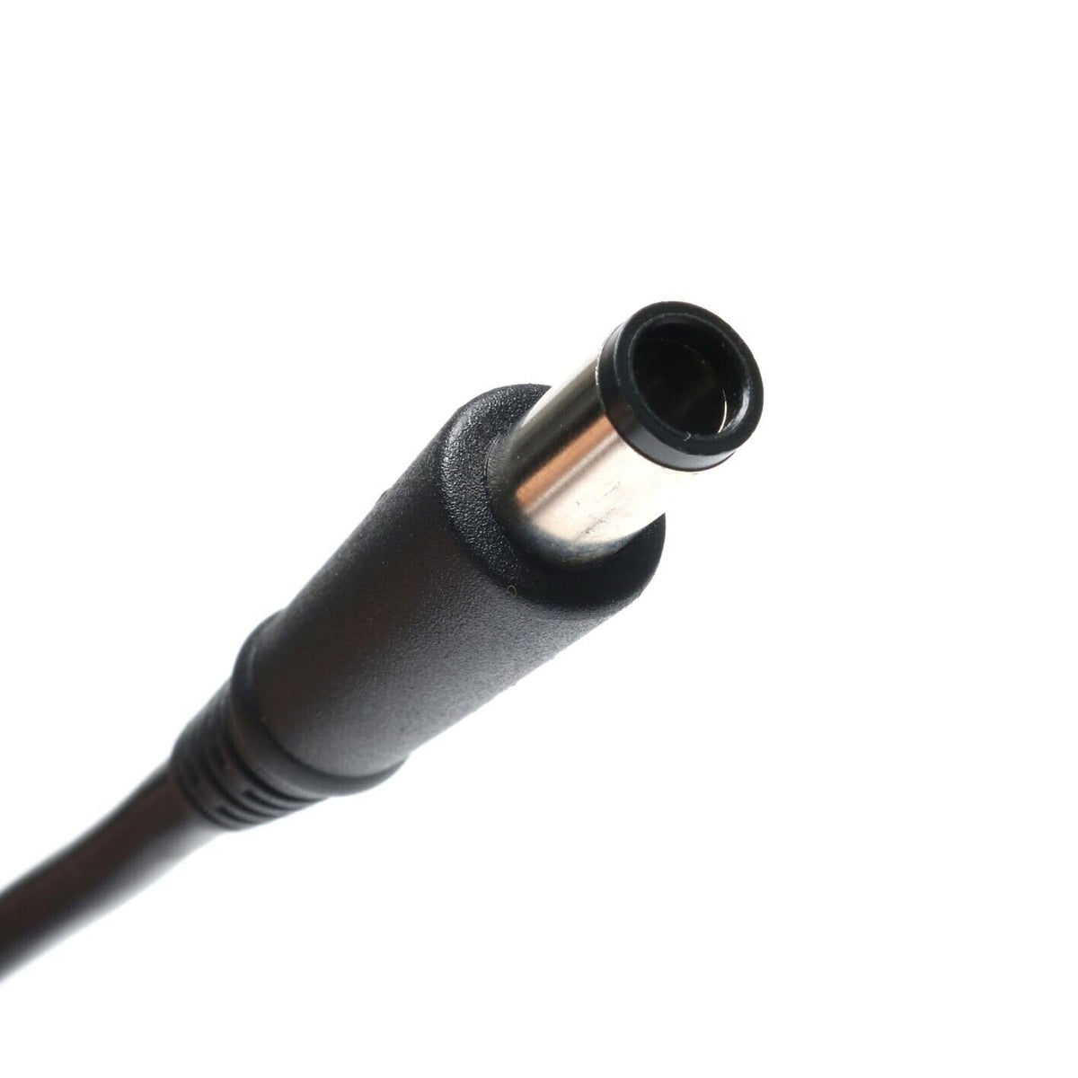 HSXIRQA 7.4mmx5.0mm connector closeup, precise fit and secure connection