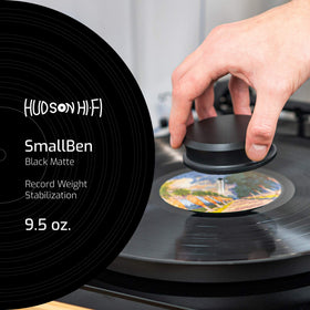 Protective leather pad between record and stabilizer reduces resonance