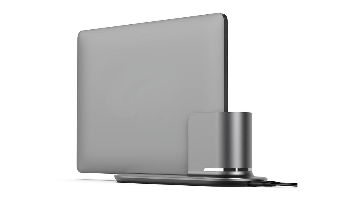 HumanCentric DockBook vertical dock setup beside MacBook Pro for quick connect