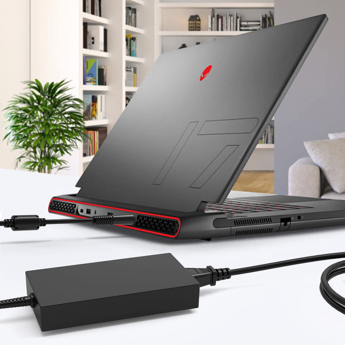 HXHTEC charger plugged into Alienware laptop restoring power quickly benefit