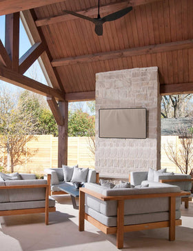 iBirdie on patio with furniture showing outdoor TV protection and neat aesthetic