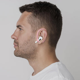 ICARERSPACE pink earhook demonstrating secure fit for running and cycling.